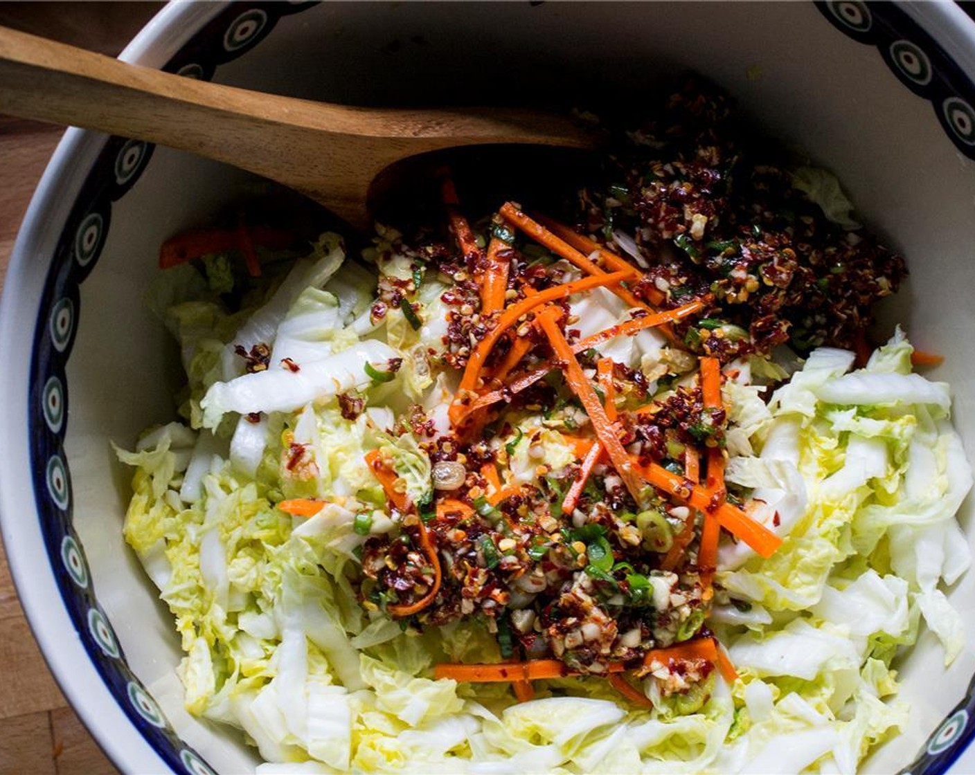 step 5 Add the paste to the sliced cabbage and mix well with your hands.