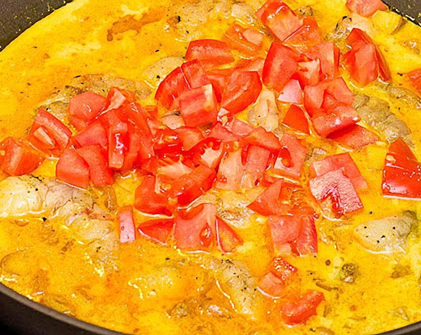 step 4 Add Shrimp (8 oz), Tomato (1), Tomato Paste (1 Tbsp), Honey (1 Tbsp), and Chili Powder (1 tsp). Cover and simmer for about 30 minutes, stirring occasionally.