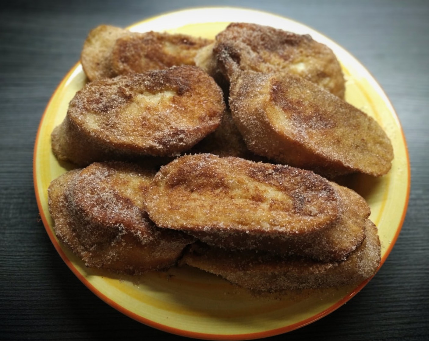 step 8 Coat the slices of bread in the cinnamon-sugar mixture. You can eat the torrijas warm or cold. Enjoy!
