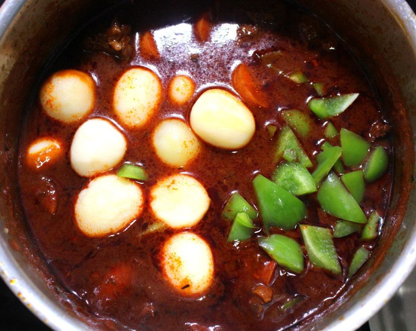 step 9 Once the carrots are tender, add Potato (1 cup) and Green Bell Pepper (1/2 cup).