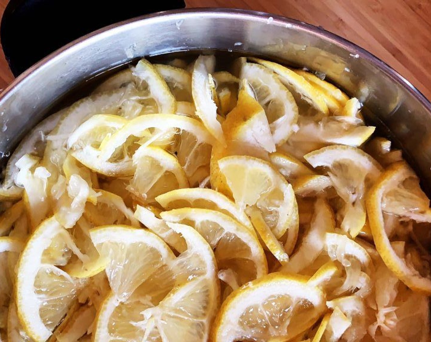 step 3 Place the sliced lemons into a large bowl, cover with water and let it marinate for 24 hours.
