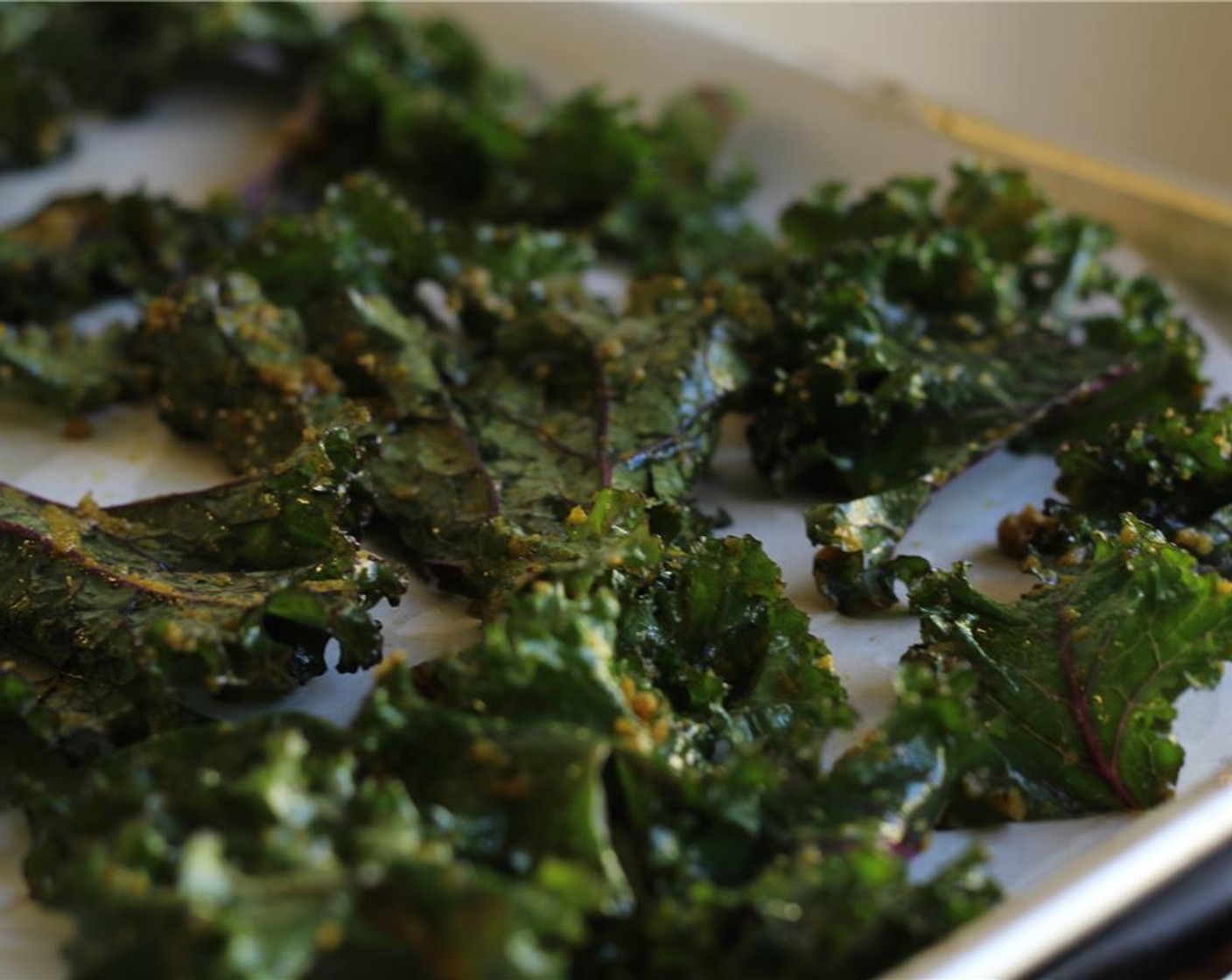 step 5 Spread the tossed kale on a baking sheet and bake for 15-20 minutes or until crispy.