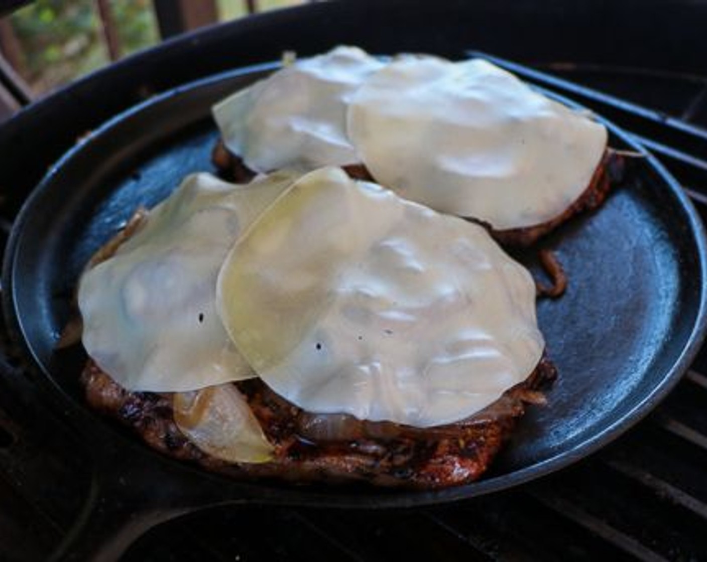 step 7 Top each steak with onions and mushrooms; layer on 2 slices of Provolone Cheese (4 slices) on each steak and let it melt on the grill for 30 seconds.