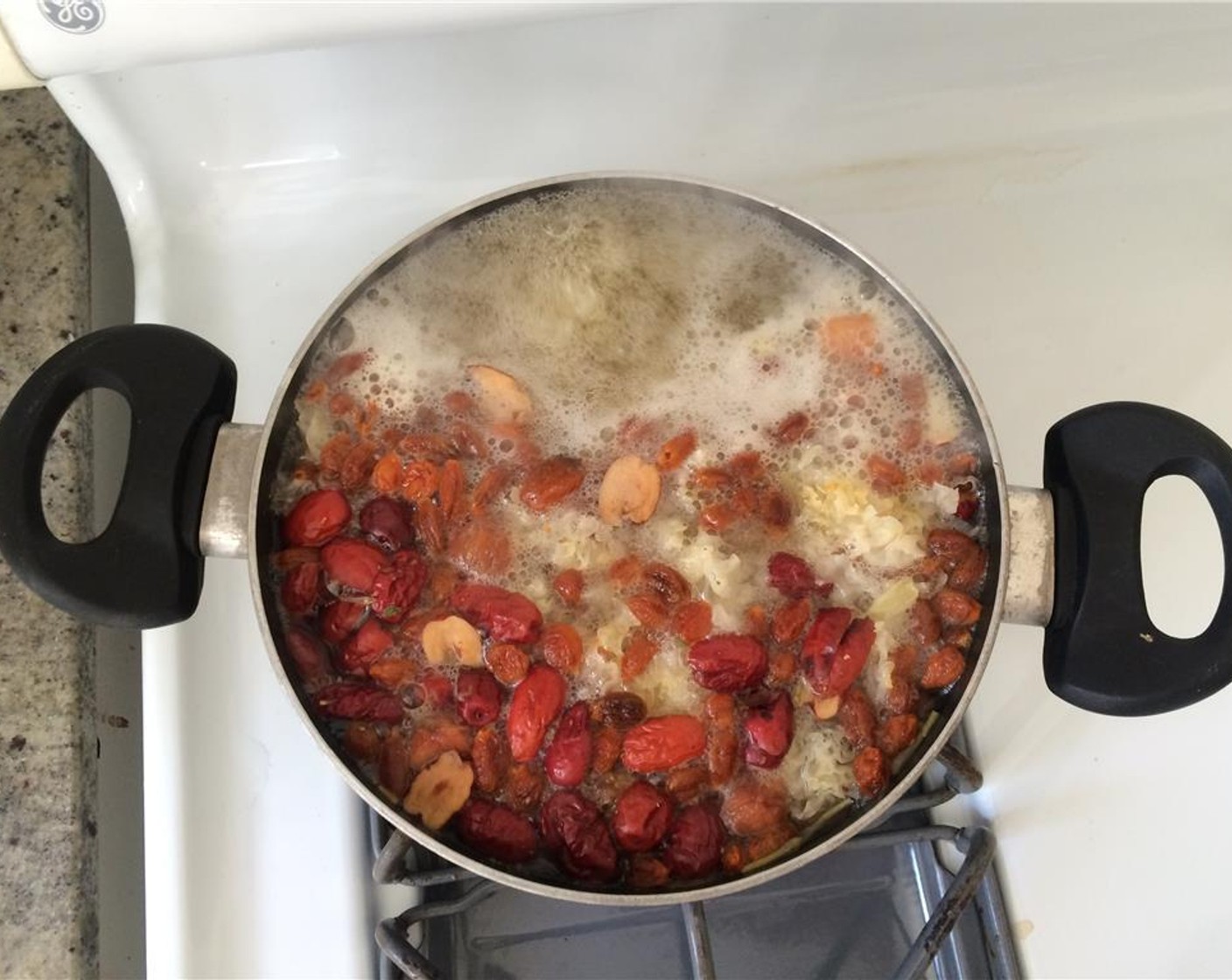 step 4 Rinse Dried Red Dates (20), Goji Berries (10) and Dried Longan (1/3 cup) in warm to hot water for 10 seconds.