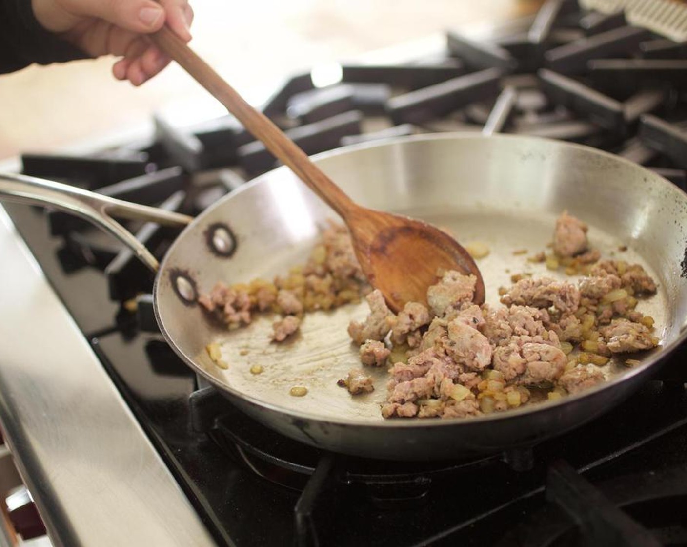 step 5 Crumble the turkey sausage into the pan. Increase heat to medium-high and cook, breaking the turkey sausage up as you stir, until the sausage is fully cooked.