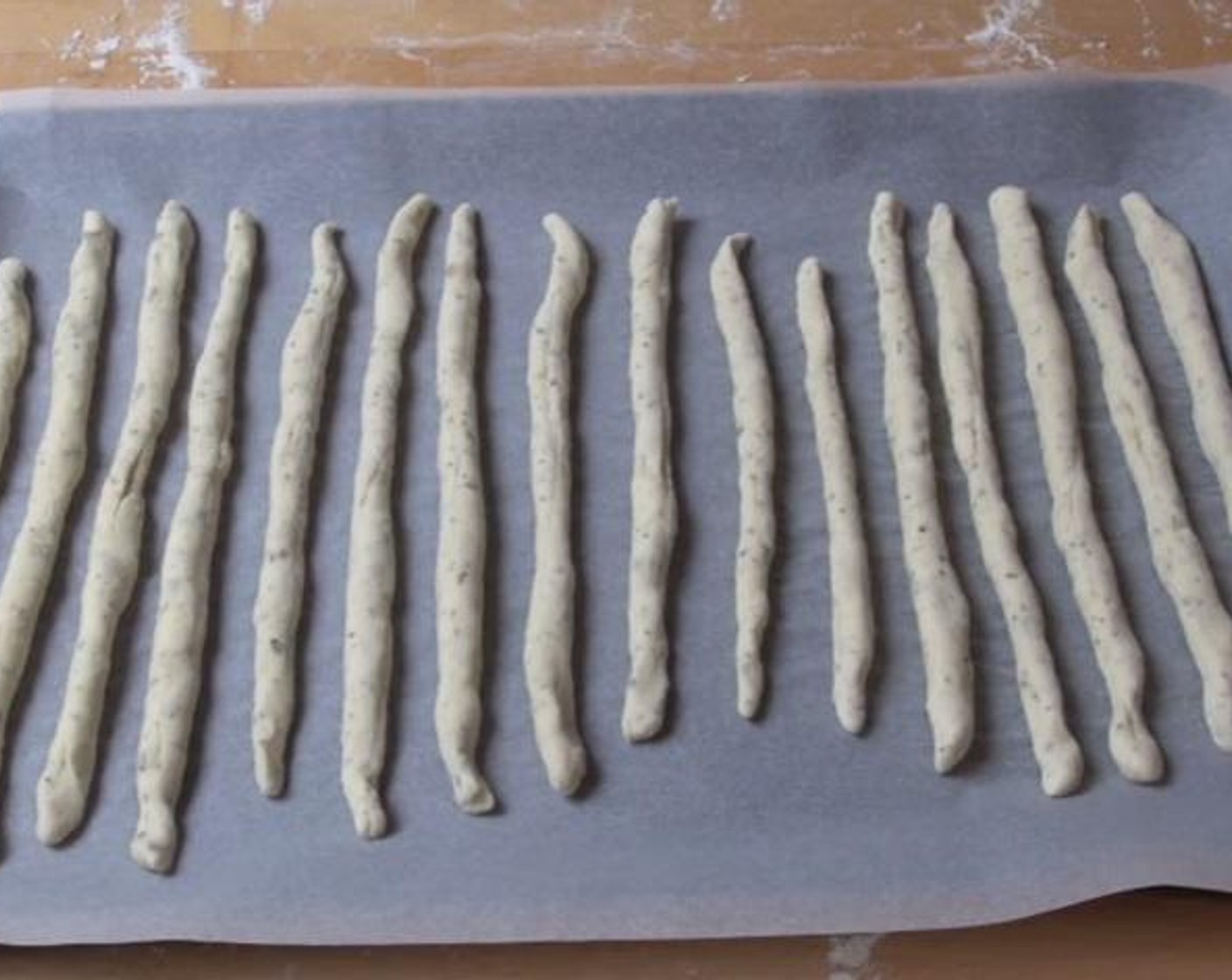 step 6 Lay your bread sticks on an oven plate. Brush each bread stick with some Olive Oil (2 Tbsp), season with some Salt (1/2 tsp), and bake inside an oven at 200 degrees C (400 degrees F) for about 15 minutes.