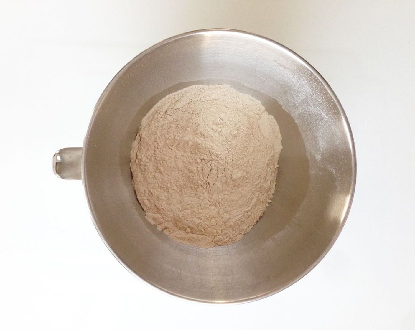 step 3 Mix together White Whole Wheat Flour (2 cups), Natural Sweetener (2 Tbsp), Baking Powder (1/2 Tbsp), Baking Soda (1 tsp), and Ground Cinnamon (1 tsp).