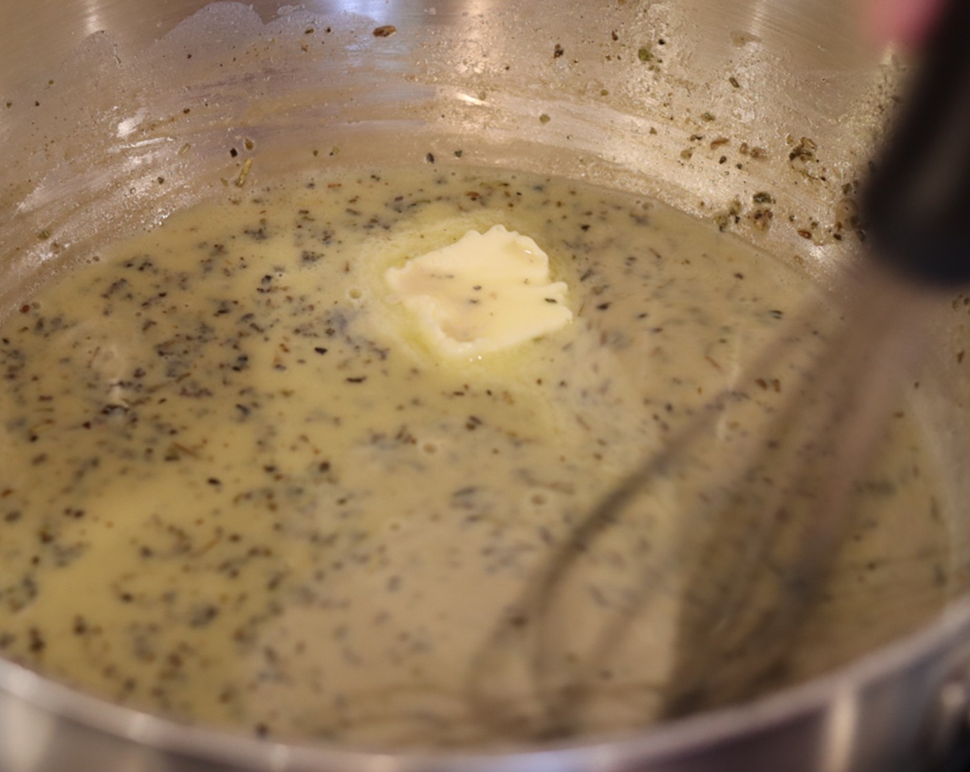 step 3 Add the Milk (3/4 cup) and continue to whisk vigorously while adding 1 tablespoon of Unsalted Butter (1/3 cup) at a time. Only add the next pad of butter after the previous one has been completely incorporated in the emulsion. Turn off heat and set aside after all the butter has been added. Add the Grated Parmesan Cheese (2 cups).