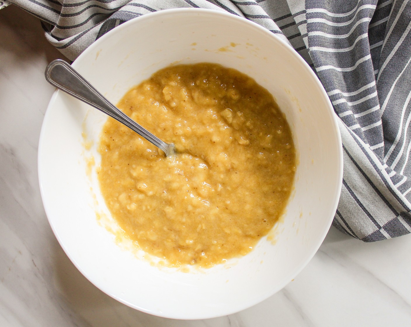 step 2 In a large bowl, mash the Bananas (4) using a fork or potato masher.