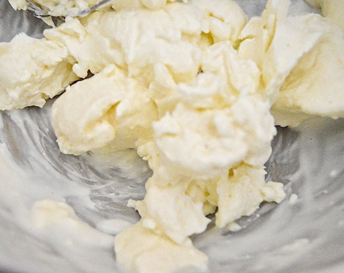 step 6 While it cooks, make the topping. Combine the Cream Cheese (1 cup), Milk (1 Tbsp), Powdered Confectioners Sugar (1 Tbsp), and the rest of the Simply Organic Cinnamon, Ground (1/4 tsp) together in a bowl and whip them all together with a hand mixer.