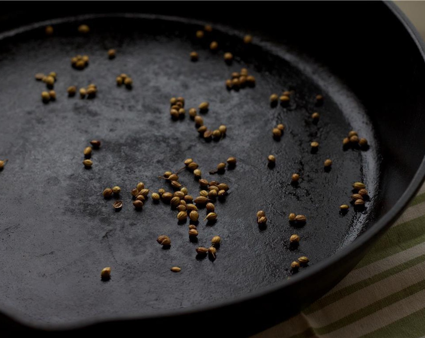 step 2 Heat a large cast iron skillet over low heat. Toast the Whole Coriander Seeds (1 tsp) for 2 to 3 minutes, stirring often. Chop coarsely.