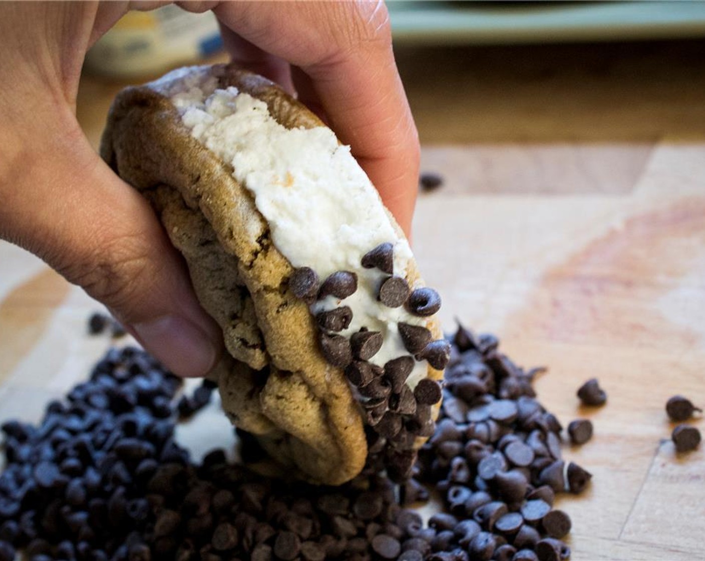 step 9 Immediately roll the cookie sandwich in the chocolate chip mini morsels and place on a plate in the freezer. Repeat with the remaining cookies. Cover the dish with plastic wrap and freeze for at least 4 hours.
