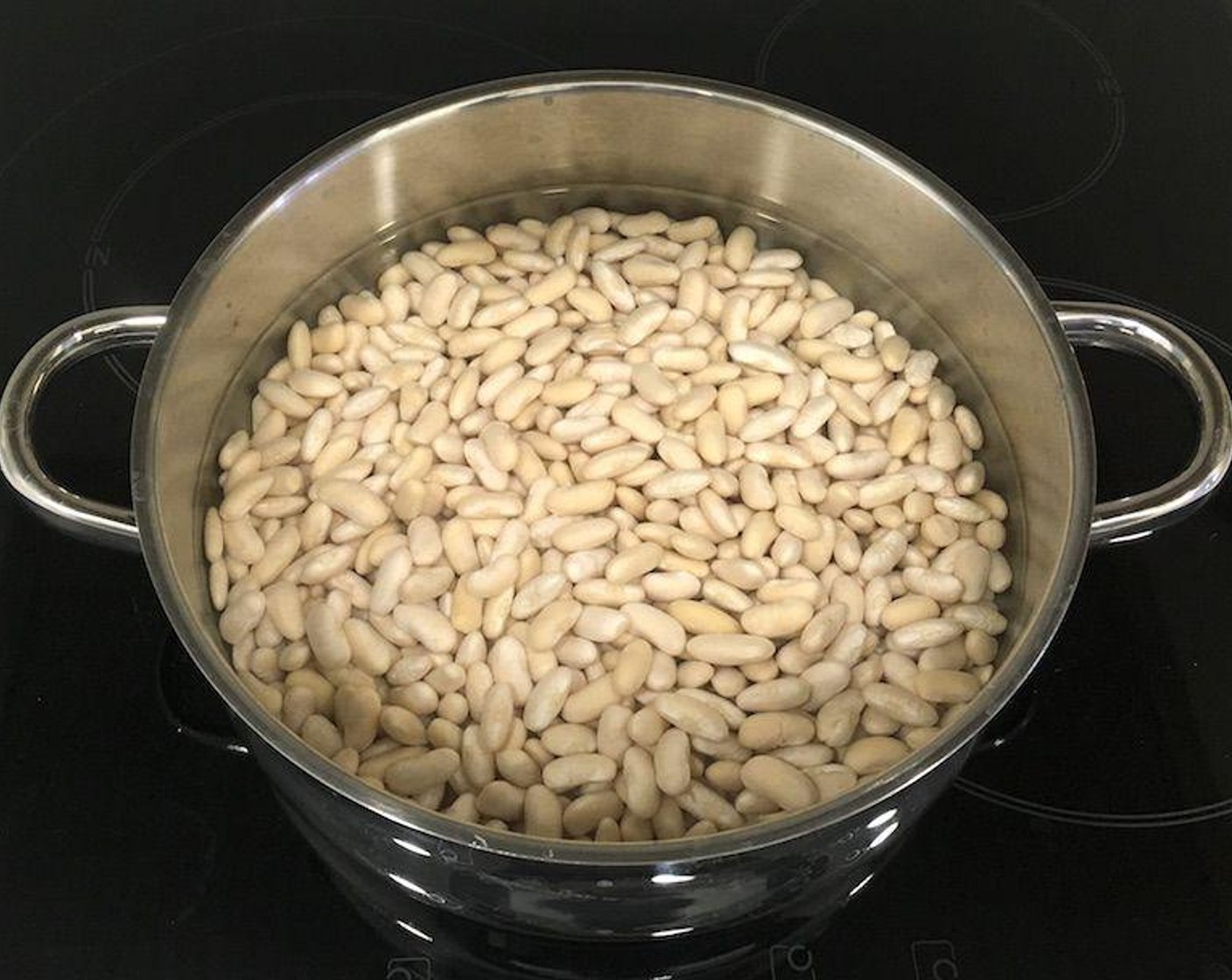 step 1 Rinse Dry Cannellini Beans (2 cups) and soak overnight completely covered with water.