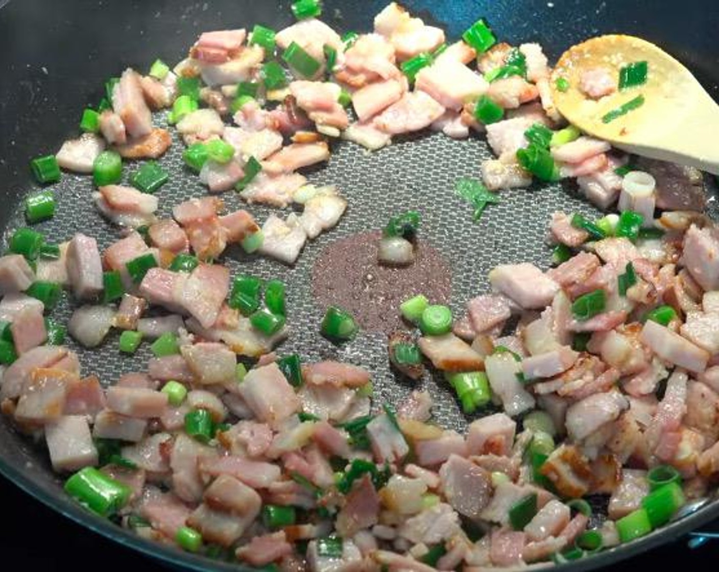 step 3 Add in Garlic (1 clove) and Scallion (1 bunch). Cook for 2-3 minutes.