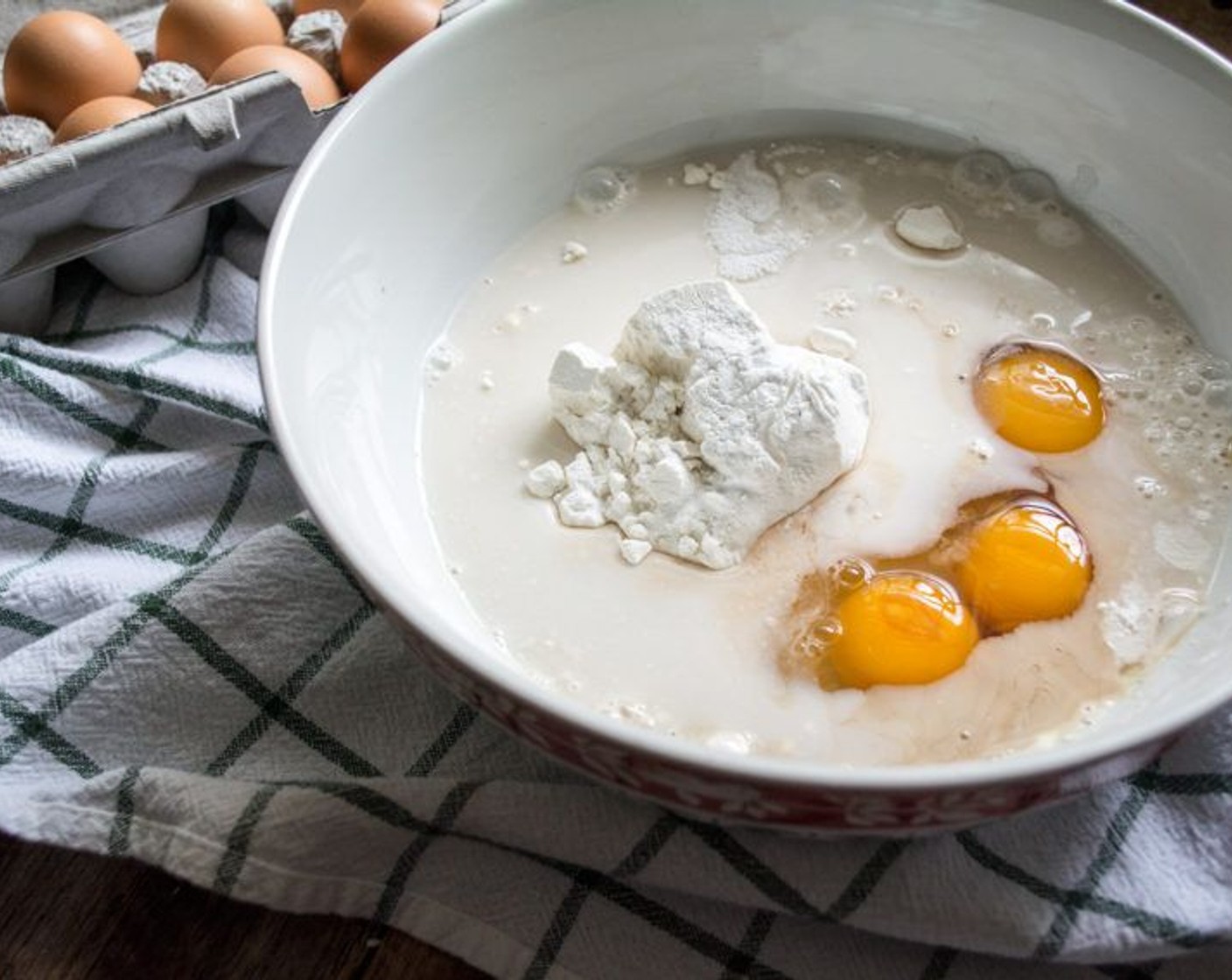 step 8 Add Vanilla Extract (1 tsp), Honey (1 Tbsp), Eggs (3), and Almond Milk (1 cup), then whisk 1 to 2 minutes or until batter is blended well with little to no clumps. The batter should be very thin, not thick like pancake batter. Add more milk if needed.