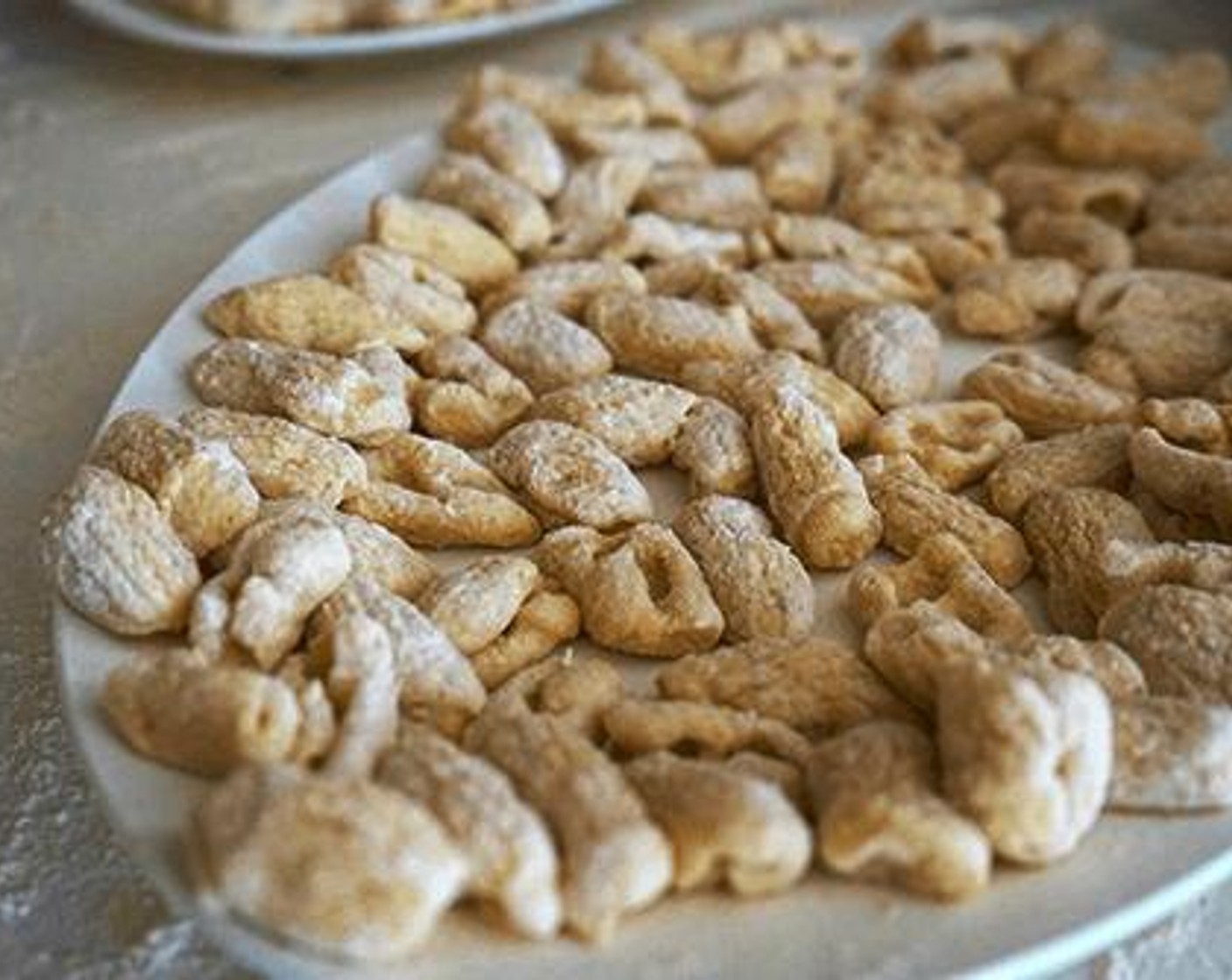 step 5 Once finished, bring Water (20 3/4 cups) to boil in a large pot and add the gnocchi in.When the gnocchi have risen to the top, wait a few seconds then gather them up a small portion at a time, using a large hand sieve/strainer.