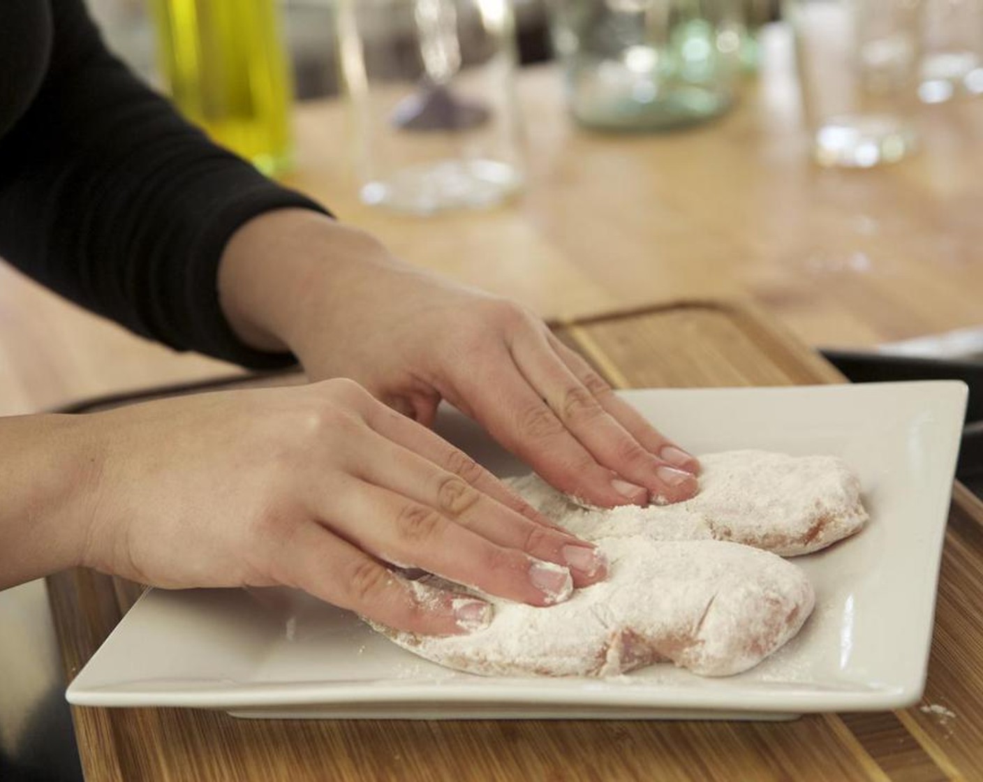 step 3 Pat dry Chicken Breasts (2) dry with paper towels. Season with Salt (1/4 tsp) and Ground Black Pepper (1/4 tsp) on both sides. Sprinkle the All-Purpose Flour (1/3 cup) evenly onto a plate. Dredge the chicken in the flour.