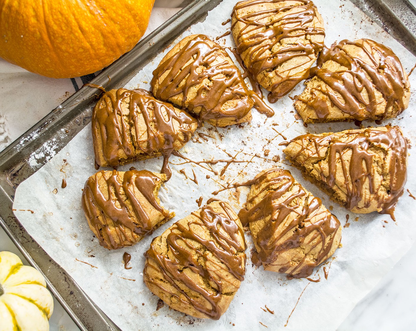 step 12 Once scones are baked and cooled, drizzle each one with the pumpkin glaze and serve fresh!