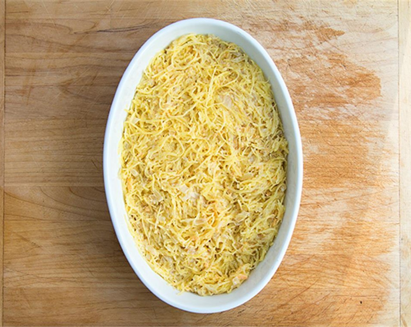 step 7 Transfer the mixture to a roughly 2.5 quart casserole dish and smooth the top with a spatula. Sprinkle the remaining shredded cheese over the top, and return to the oven to bake for 30 minutes at 400 degrees F (200 degrees C).