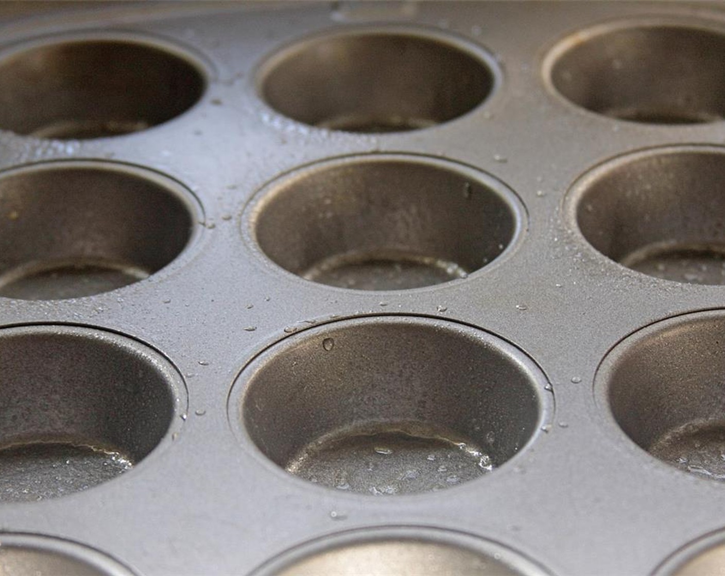 step 8 Grease muffin tin or use paper liners.