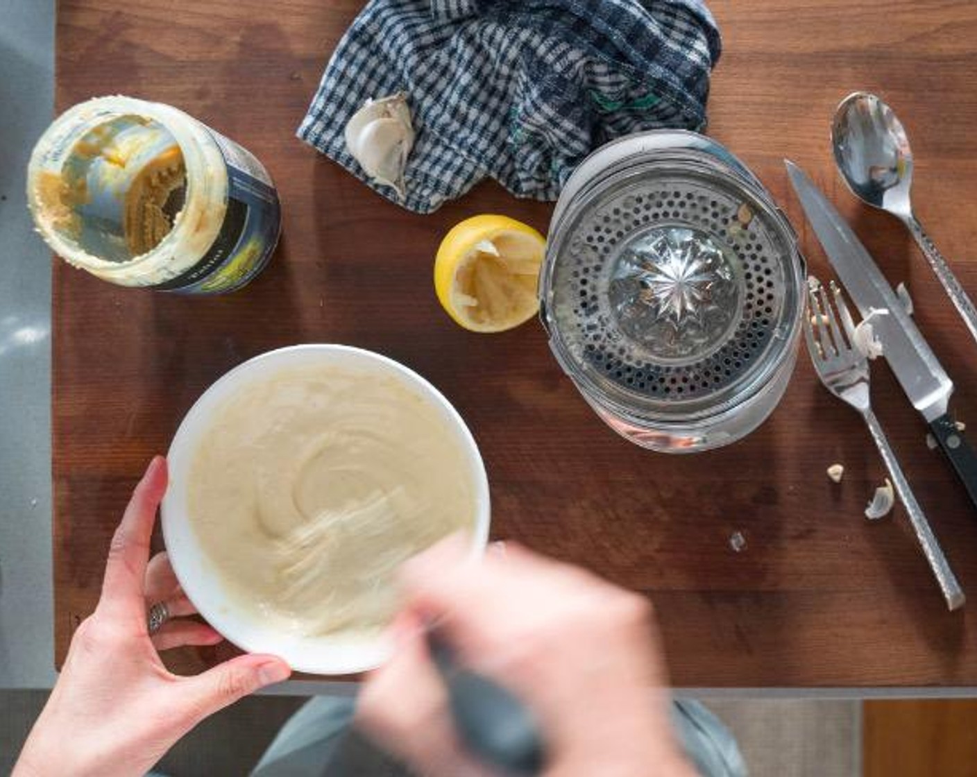 step 6 To make the dressing, combine Tahini (2 Tbsp), Lemon (1), Garlic (1 clove), Extra-Virgin Olive Oil (2 Tbsp), and Sea Salt (1 pinch). Add water as needed to thin it out but be careful not to make it too thin.