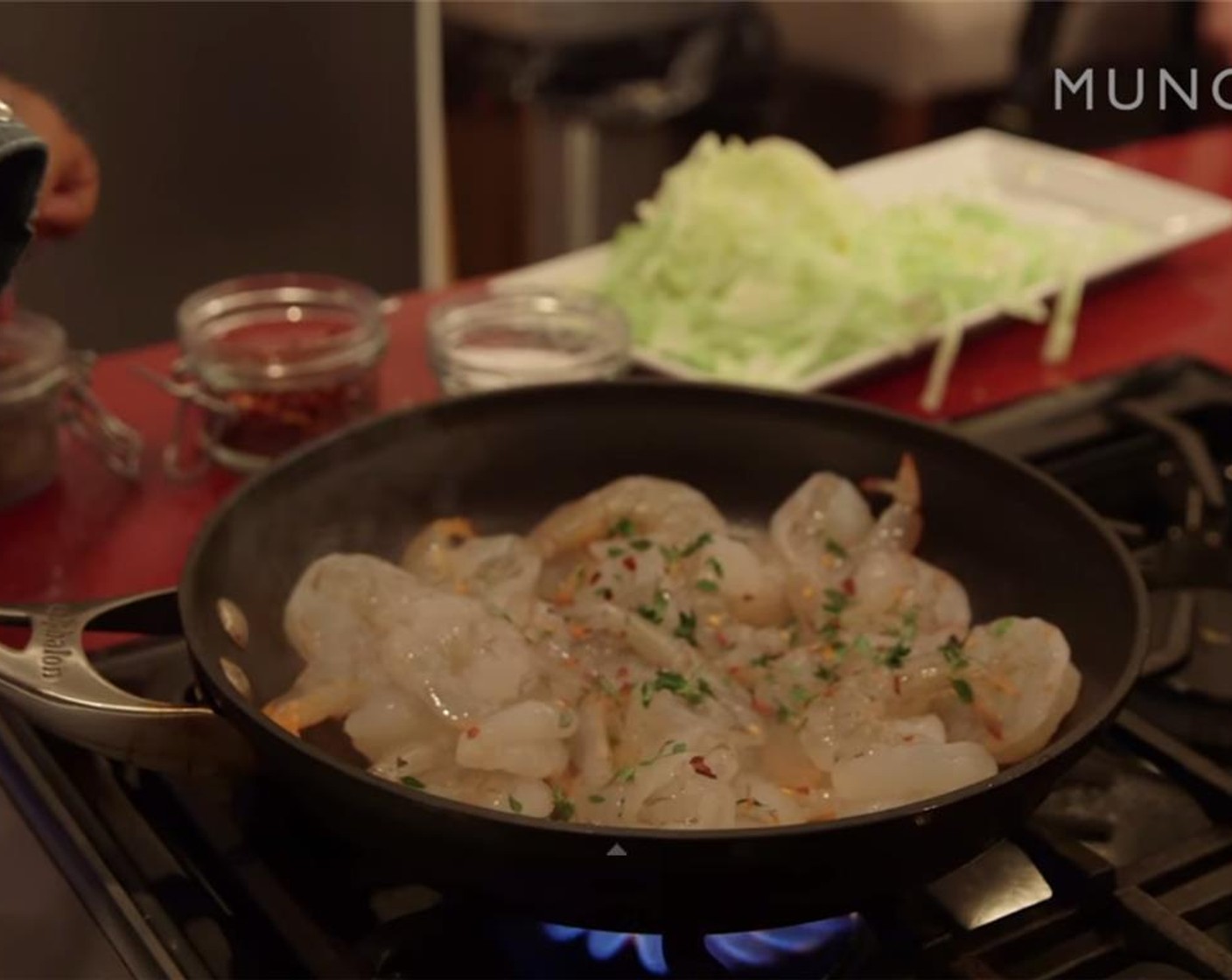 step 8 In a separate pan, cook the Fresh De-Veined Shrimp (1 lb) over medium-high heat for ten to twelve minutes. Sprinkle a pinch each of fresh thyme and chili flakes. Season with Salt (to taste) and Ground Black Pepper (to taste). Move onto plate to cool. Set aside.