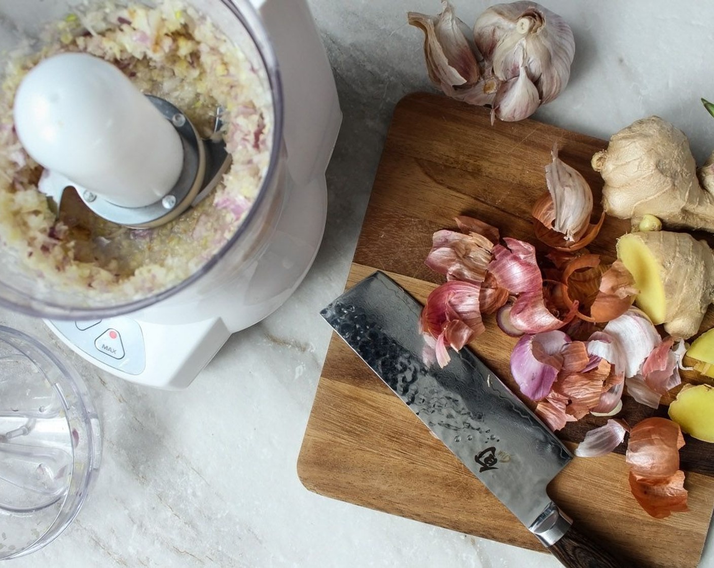 step 9 In a food processor, blitz the garlic, shallot and ginger.