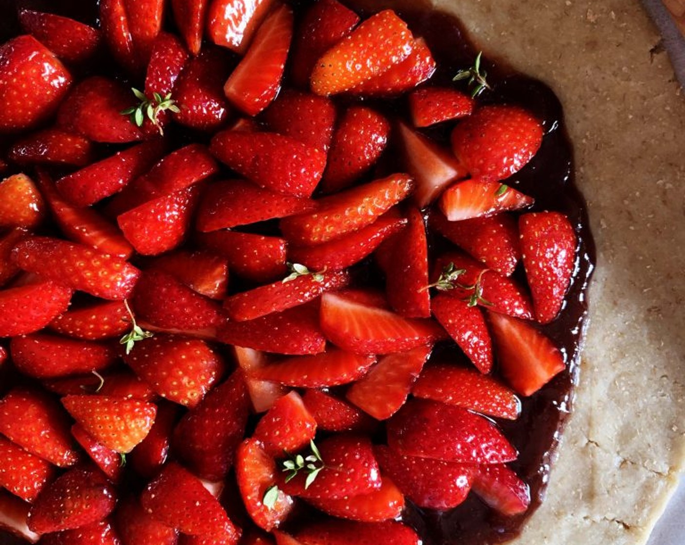 step 6 Spread the Strawberry Jam (3/4 cup) in the center, leaving about 1-inch from the edge. Cover with the strawberries. Save the marinated juices for later.