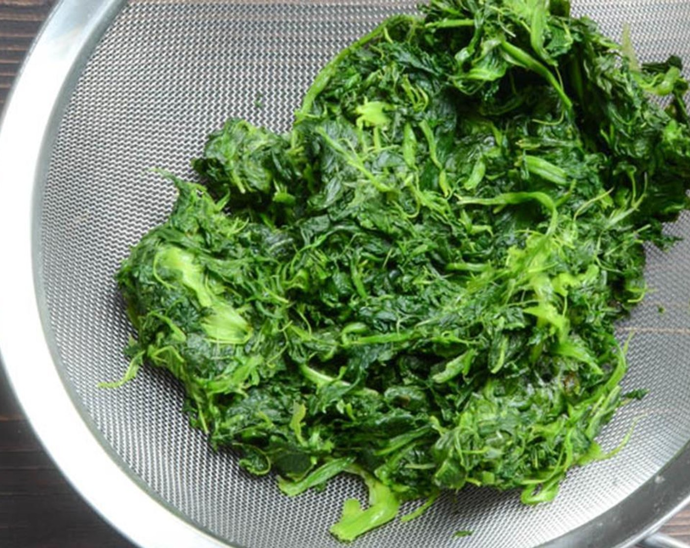 step 3 Squeeze all the excess moisture from the Frozen Spinach (2 cups) and set aside.