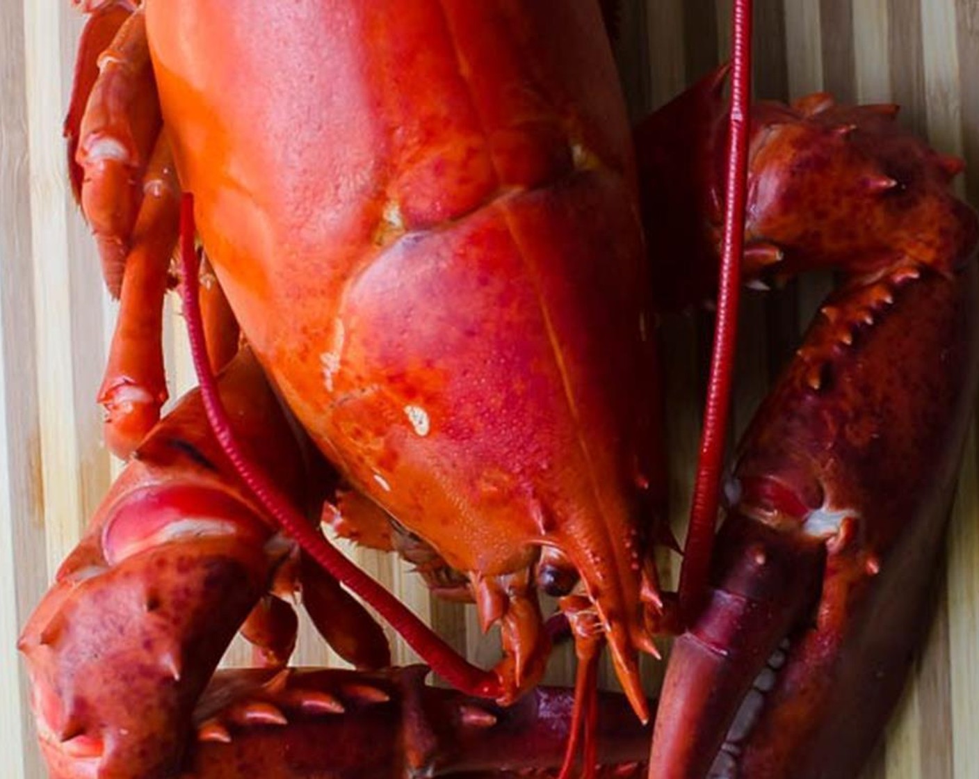 step 2 Place the Lobster (2) into the steamer basket and cover the lid. Steam the lobster until red and fully cooked. Remove lobster and let cool.