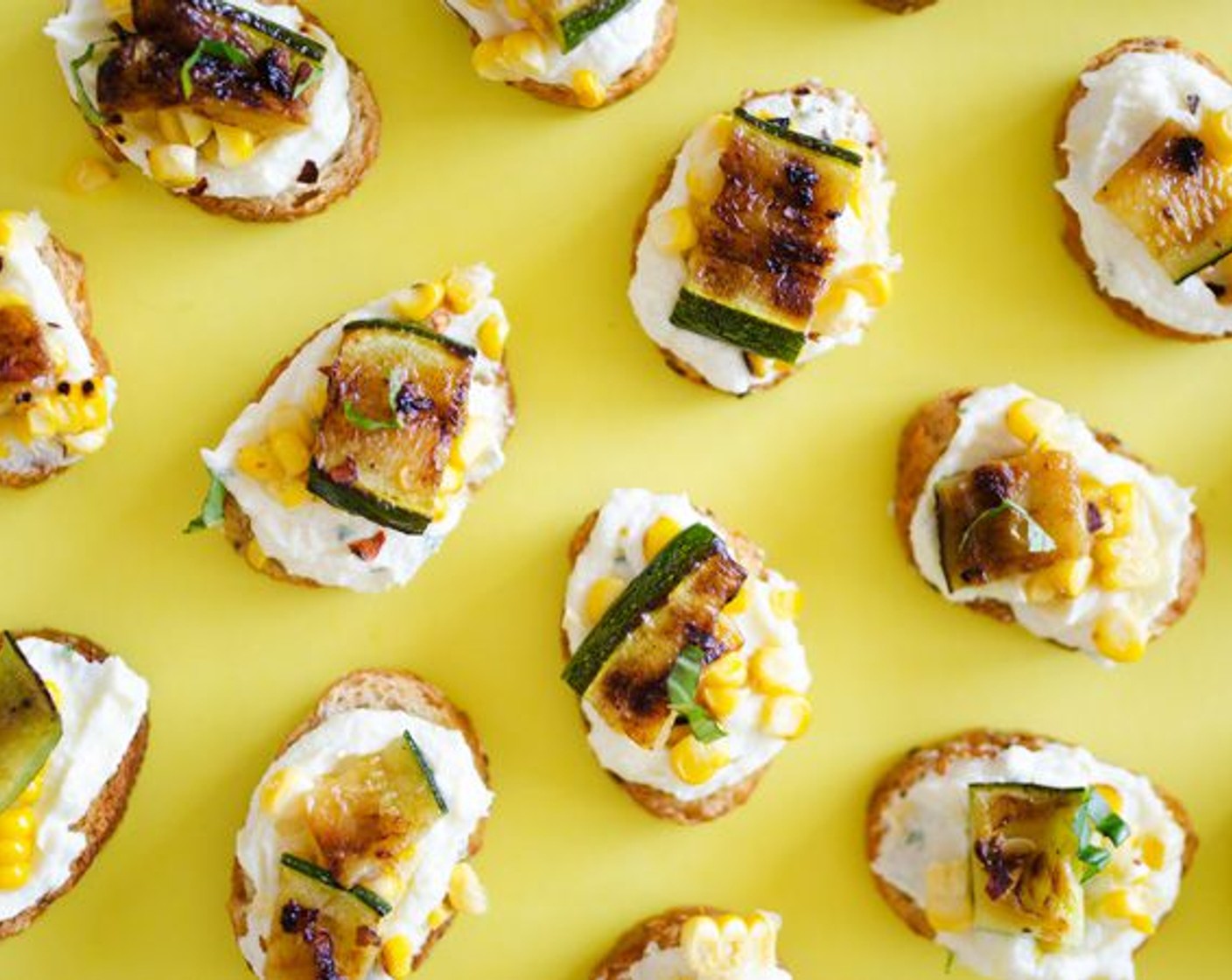 Whipped Feta, Corn, & Zucchini Crostini