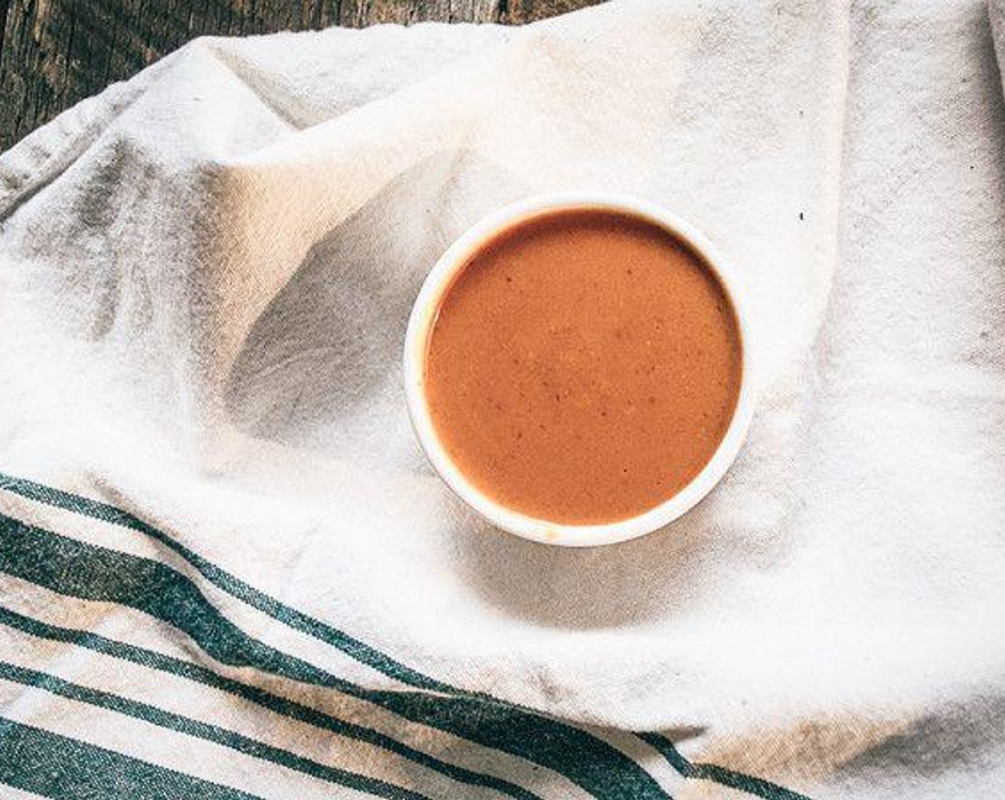 step 1 Make the Spicy Sriracha Cashew Sauce: Add Cashew Butter (2 Tbsp), Sriracha (2 Tbsp), Almond Milk (2 Tbsp), Toasted Sesame Oil (1 tsp), Apple Cider Vinegar (1/2 tsp), Maple Syrup (1 tsp), and Ground Turmeric (1/2 tsp) to a small bowl and whisk until smooth and creamy. Set aside.