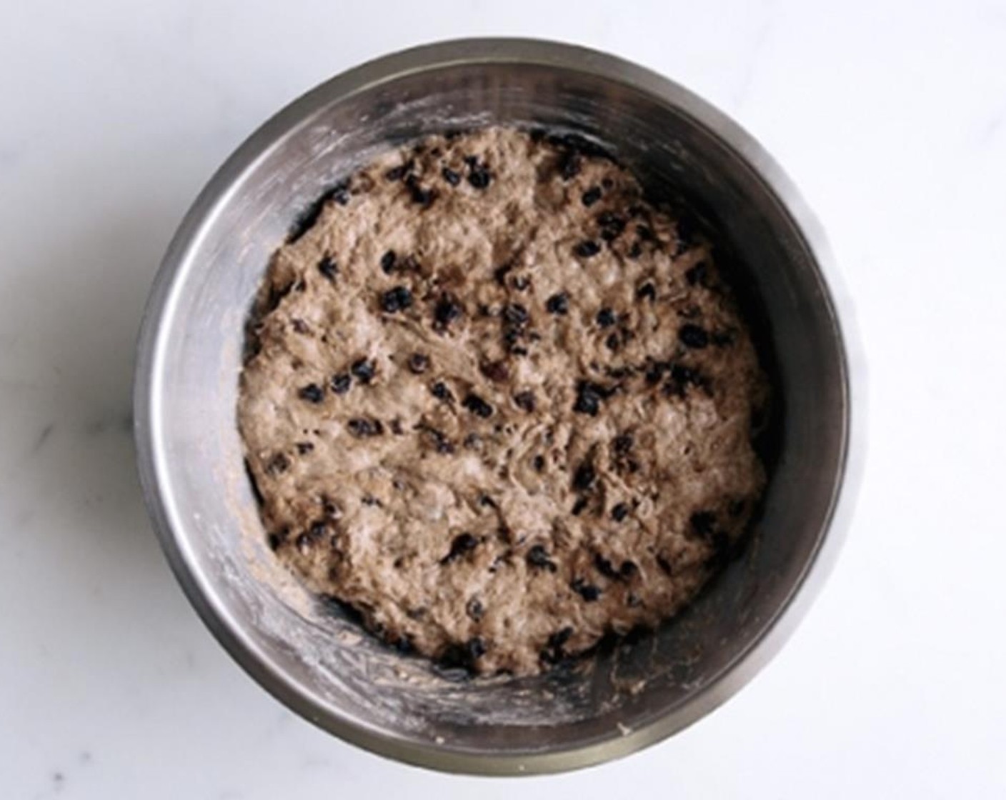step 2 Add Water (320 mL) and stir to form a sticky dough. Once combined, cover with a clean, damp tea towel, and set aside in a warm corner overnight, at least 12 to 24 hours.