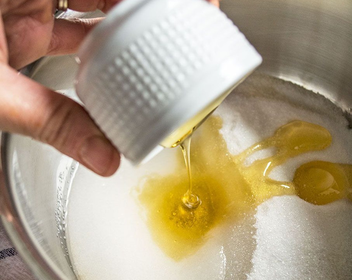 step 2 Add Raw Sugar (3/4 cup), Honey (2 Tbsp) and Water (2 Tbsp) to small sauce pan. Cook over low heat until sugar dissolves, stirring frequently.