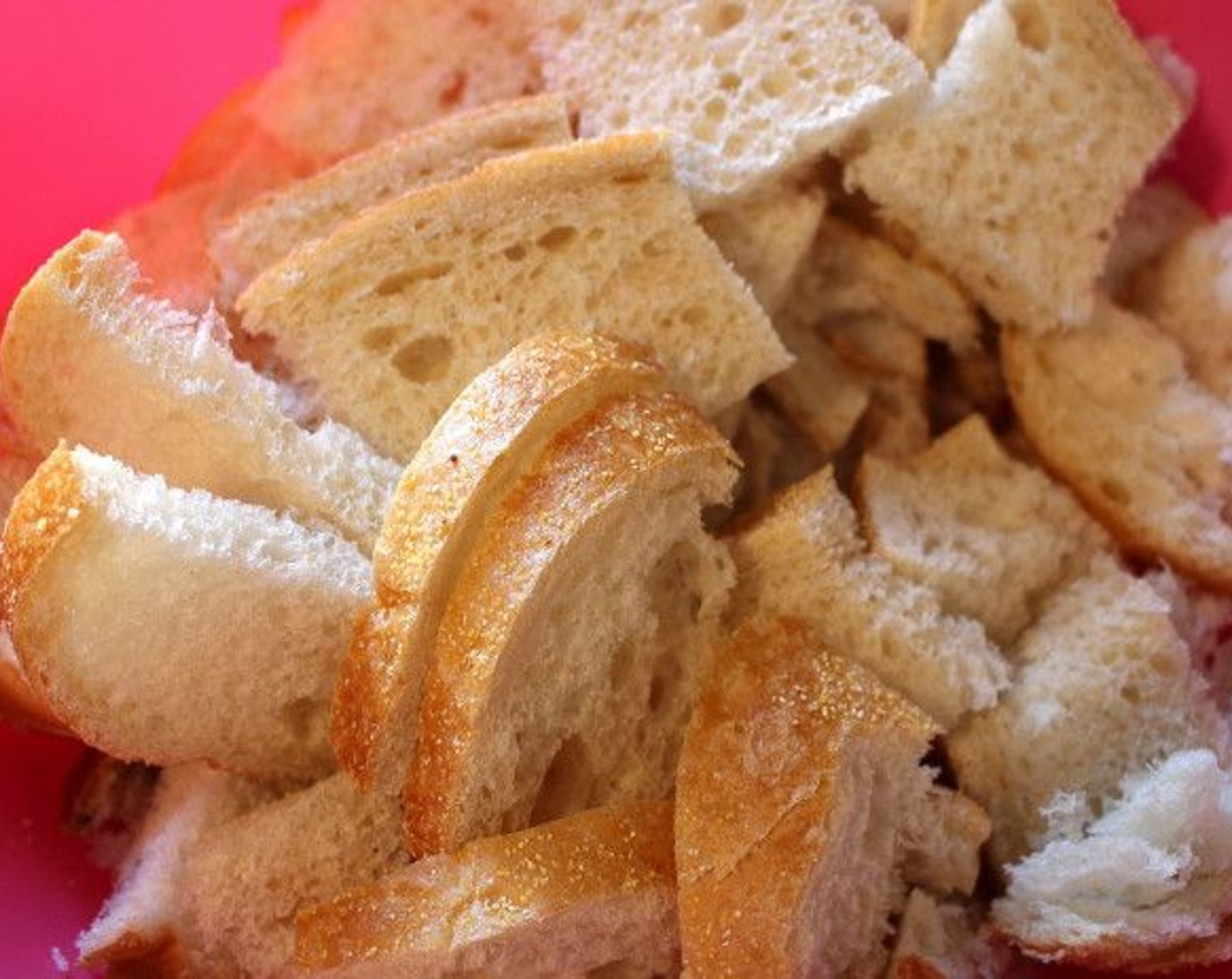 step 7 Slice the Kaiser Rolls (14) into quarters, then slice the quarters into 1/2-inch slices.