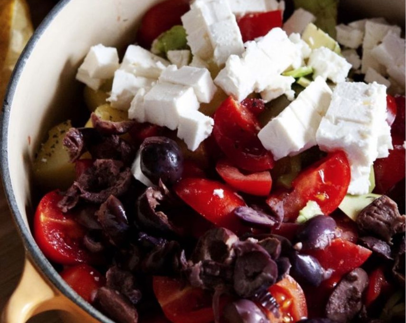 step 1 Into a large bowl, add Potatoes (4), Cherry Tomato (3/4 cup), Avocado (1/2), Kalamata Olives (1/3 cup), and Crumbled Feta Cheese (3/4 cup).