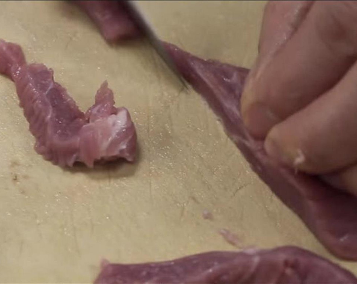 step 10 Slice the Pork (12.5 oz) into thin strips, making sure to cut across the grain.