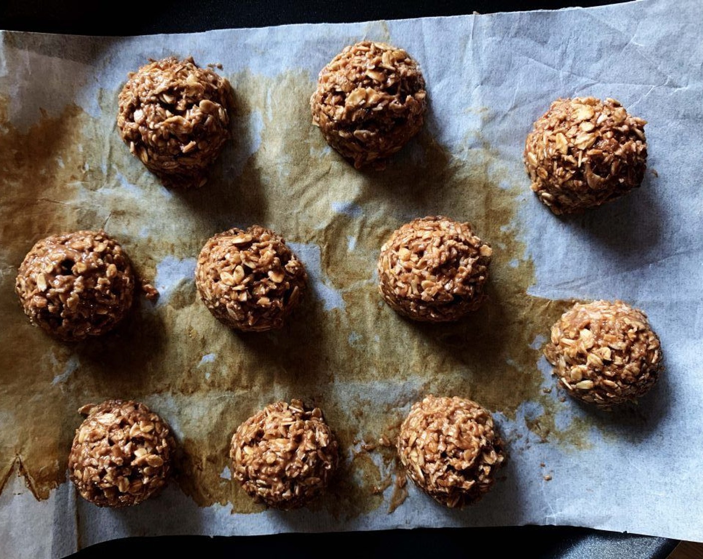 step 4 Using an ice cream scoop, portion out balls of dough onto parchment paper.