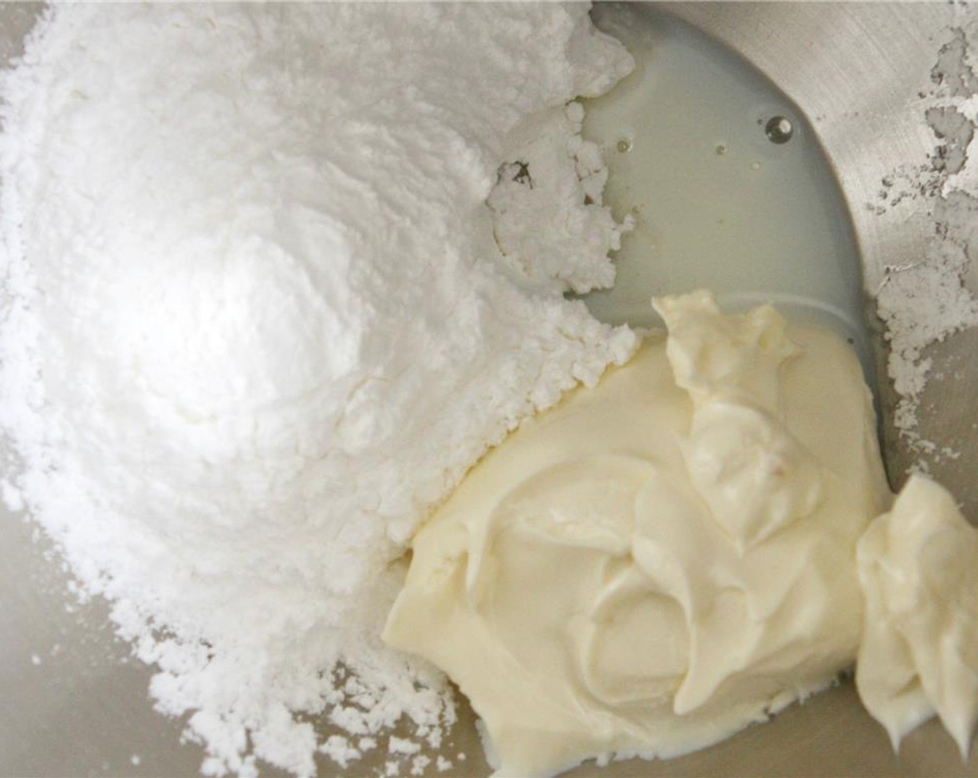 step 1 In a small bowl, combine Powdered Confectioners Sugar (1 cup), Cream Cheese (1/2 cup), and Milk (1 cup).  Stir until creamy, adding an additional tablespoon of milk, if needed. Set aside, this will be your glaze for later.