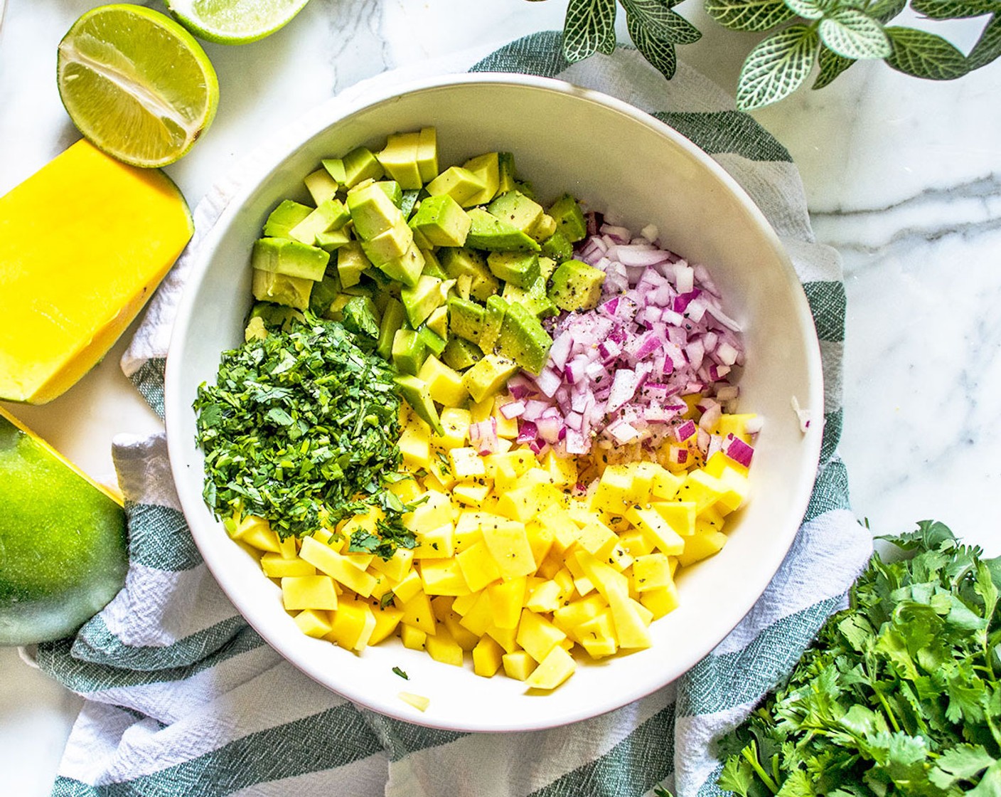 step 2 Toss in Fresh Cilantro (1/4 cup), 1 Tbsp of  Lime (1), Sea Salt (1/8 tsp), and Ground Black Pepper (to taste).