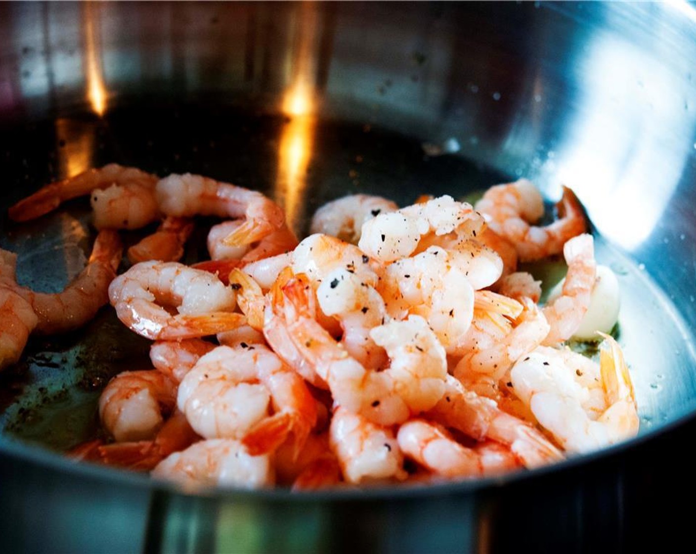 step 3 Add the shrimps, season with Salt (to taste) and Ground Black Pepper (to taste), and cook for about 10 minutes.