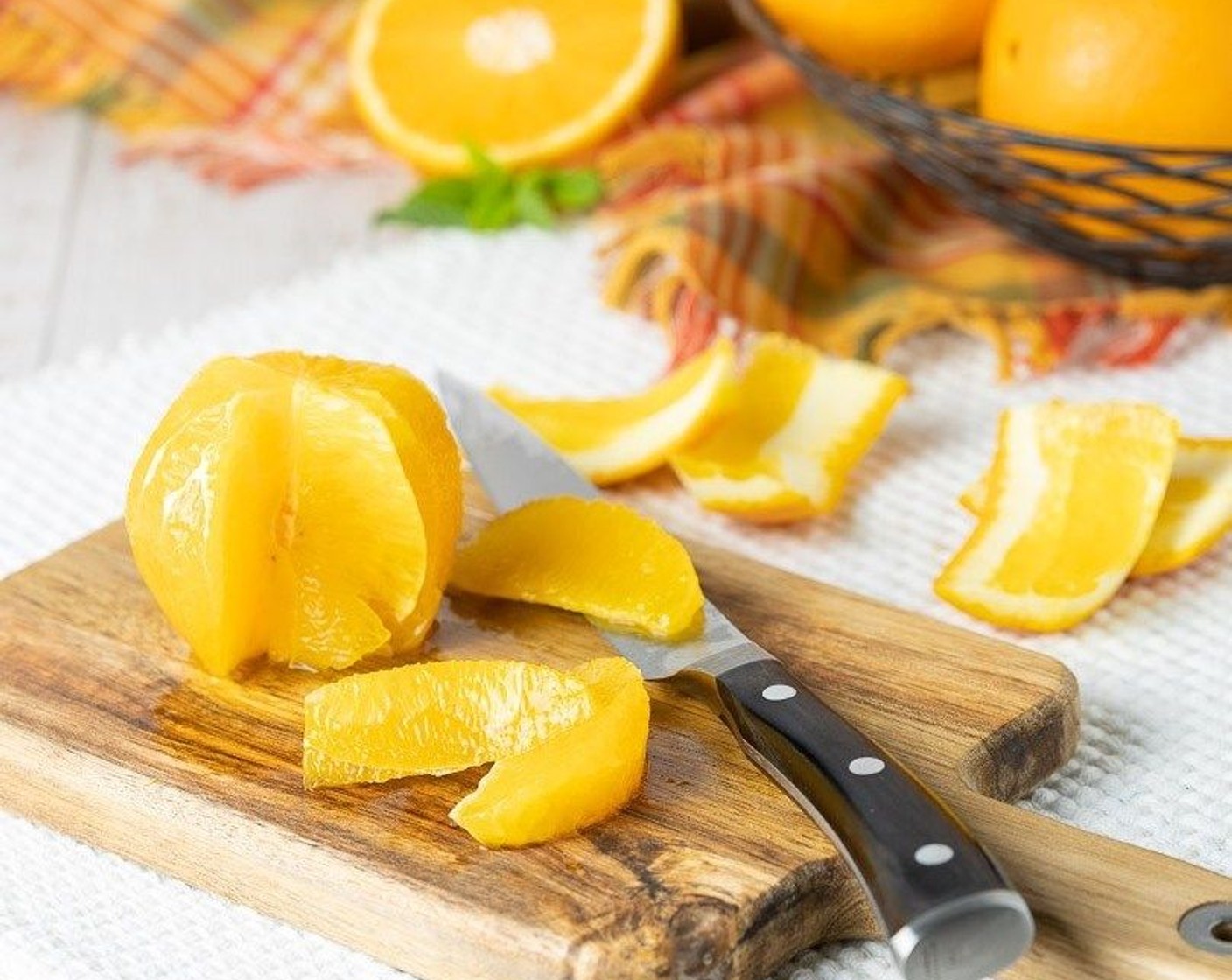 step 2 Segment the orange by running your knife along the membrane on both sides of each segment which will loosen it from the orange.