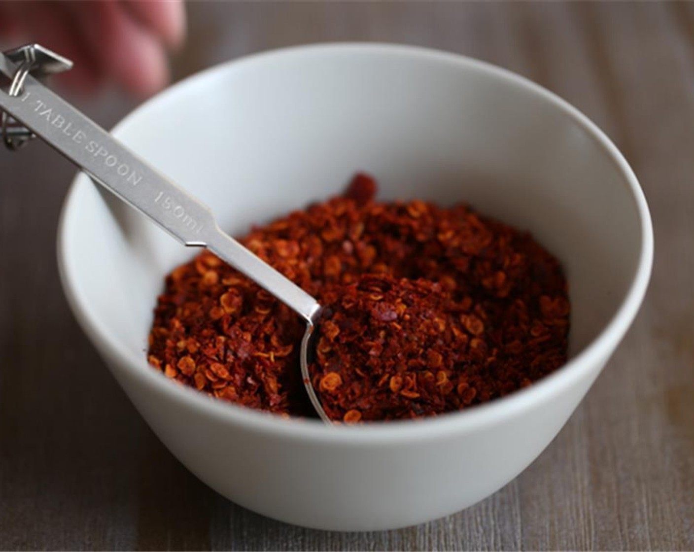 step 3 Place around 5 tablespoons of Red Chili Powder (1/3 cup) in a bowl.