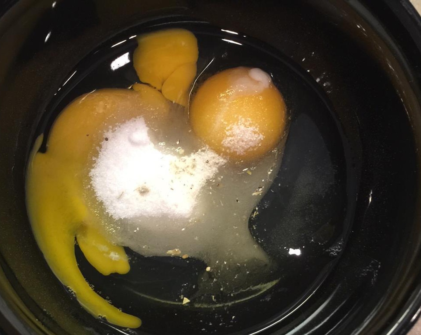 step 4 In a bowl, break Eggland's Best Classic Eggs (2). Add Ground Cardamom (1/2 tsp) and Granulated Sugar (4 Tbsp). Whisk together.
