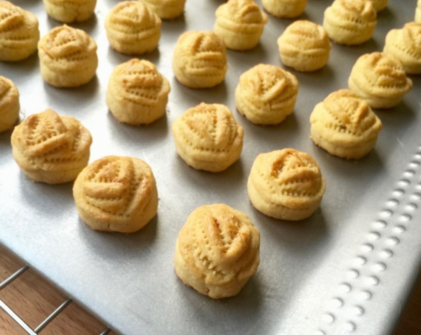 step 21 Once baked, remove the baking sheet to cool on wire rack for about 10 minutes. The pineapple tarts are very soft when hot so let it cool down before transferring them.