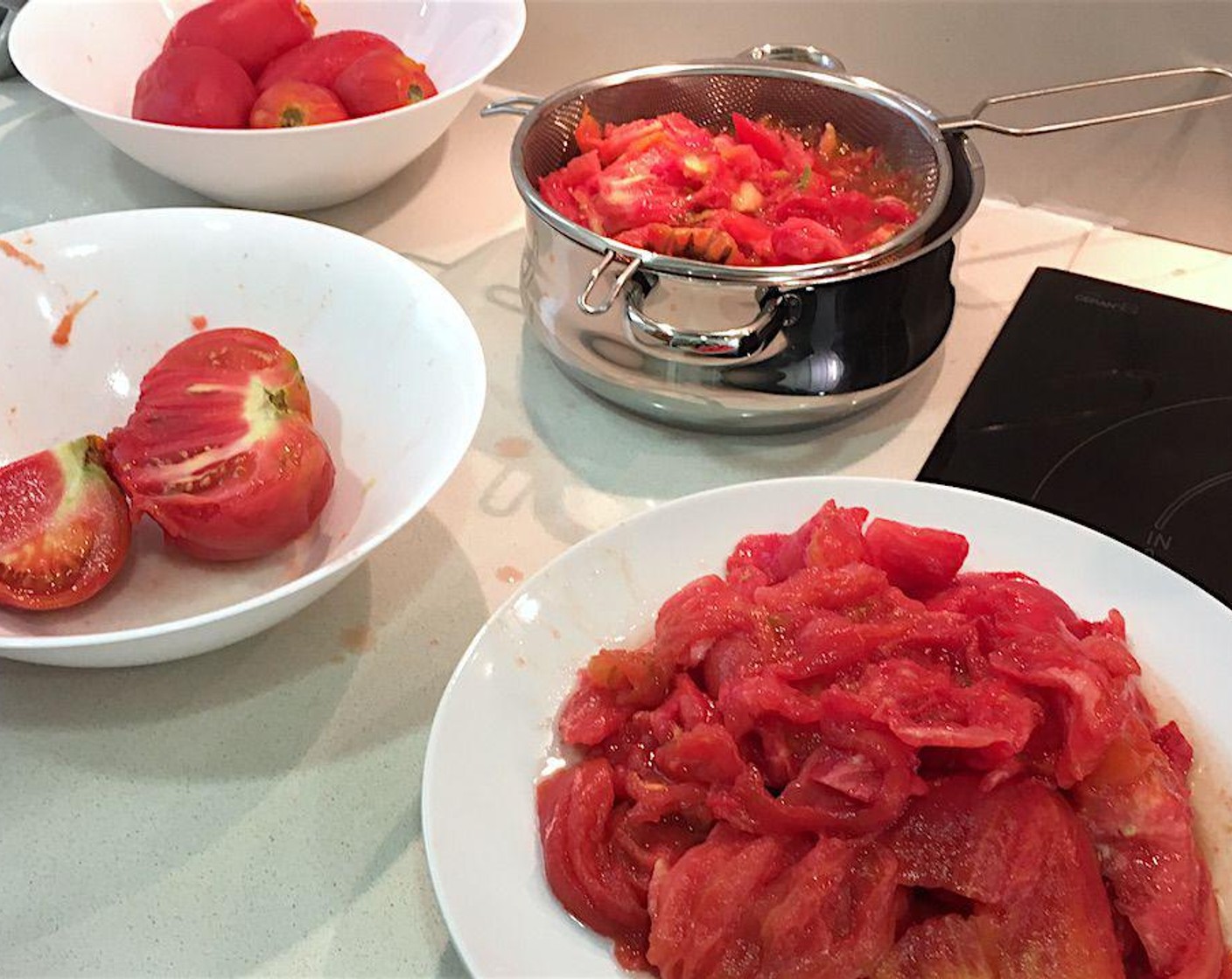 step 3 Blanch Roma Tomatoes (9 cups) in boiling water for 30 to 60 seconds, dunk in cold water and remove skins. Cut tomatoes in half to remove seeds and cores, straining any leftover juices into a bowl.