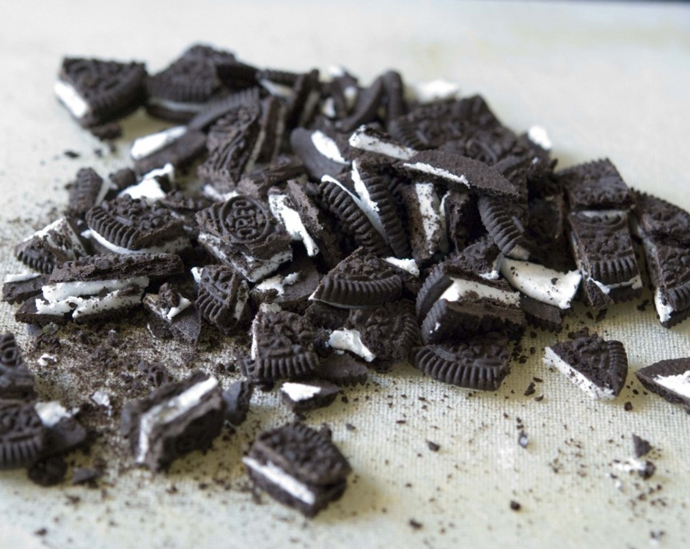 step 11 Grab the remaining Oreo® Chocolate Sandwich Cookies (1/2 pckg) and chop them up. Gently stir in chopped Oreos.