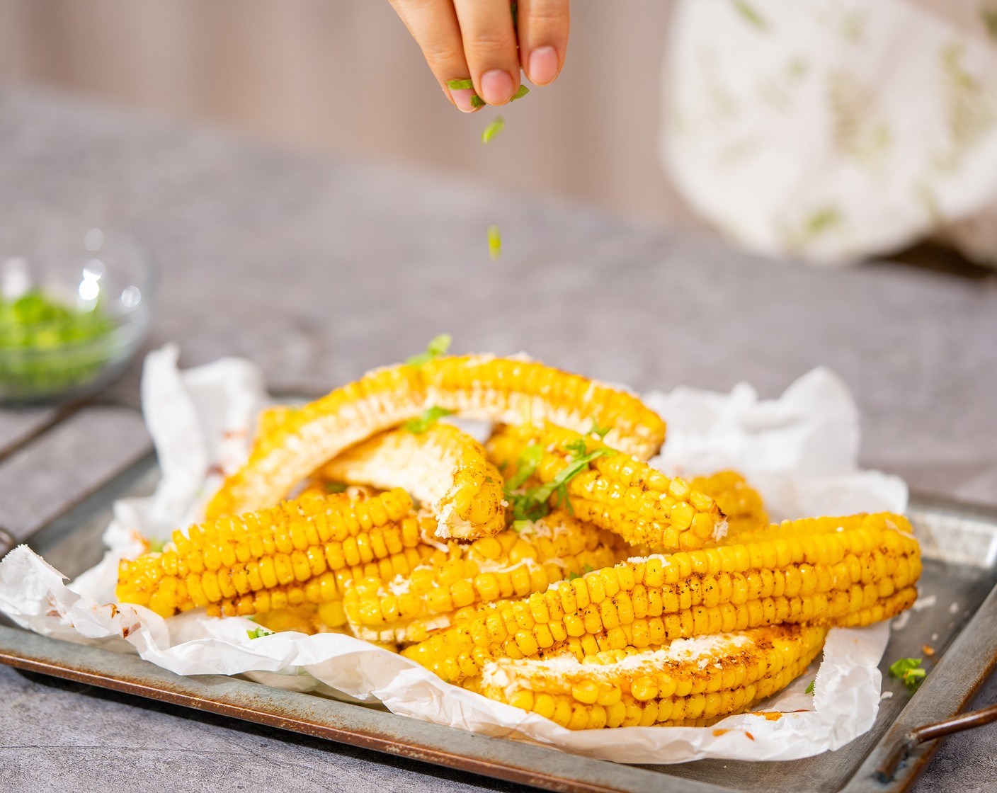 step 7 Serve corn ribs warm garnished with parmesan and Fresh Cilantro (to taste).