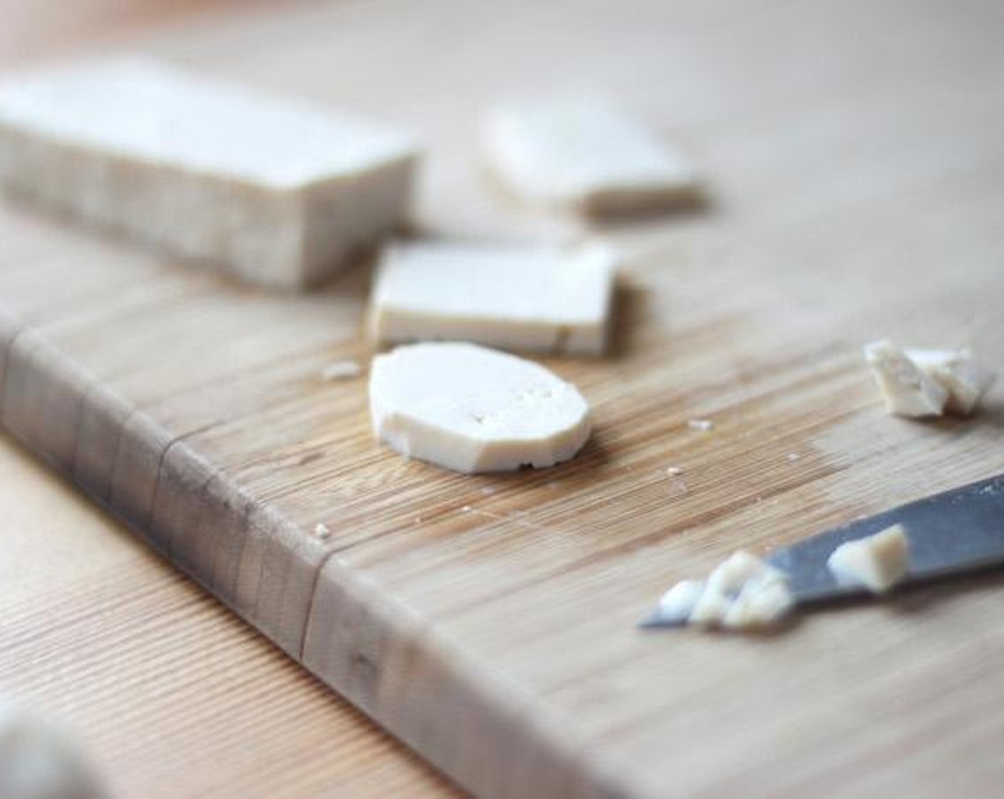 step 3 Slice up Tofu (to taste) to make his eyes, logo on a hat, and the question marks on the magic boxes.