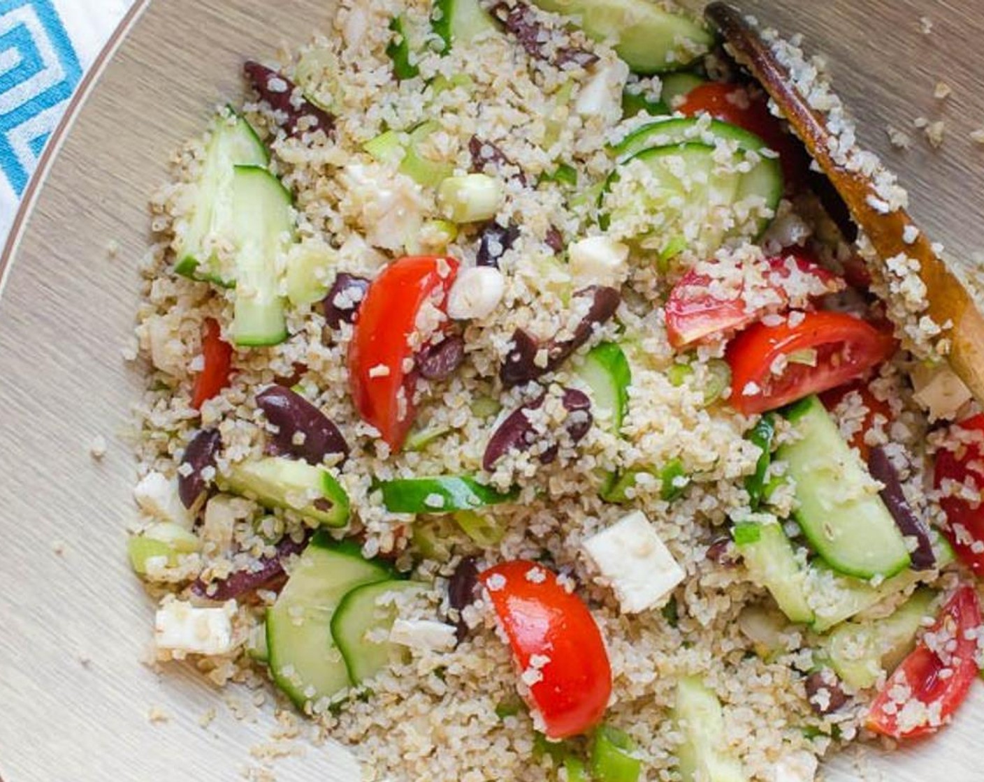 step 4 Add English Cucumber (1/2), Campari Tomatoes (5), cubes of Feta Cheese (3/4 cup), Kalamata Olives (1/2 cup), and Scallion (1 bunch).